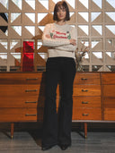 Jeans slim flare con cinturon vaquero